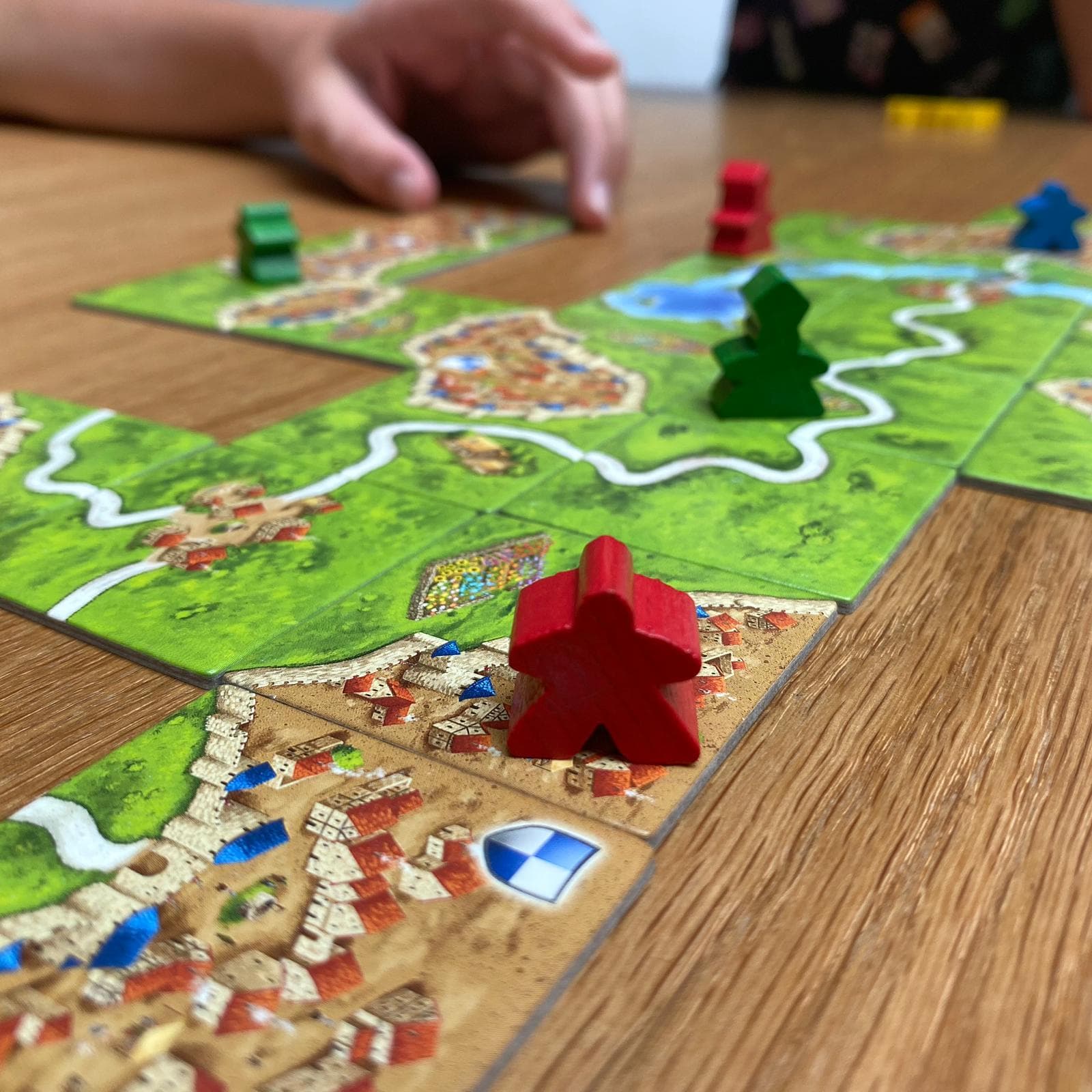 Tabuleiro do jogo Carcassonne e seus componentes